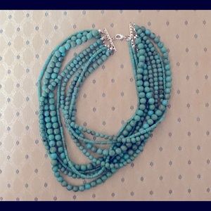 Multi-strand turquoise necklace. Perfectly paired w white tank for date night.